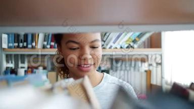 美女混血儿在图书馆看书微笑的慢动作